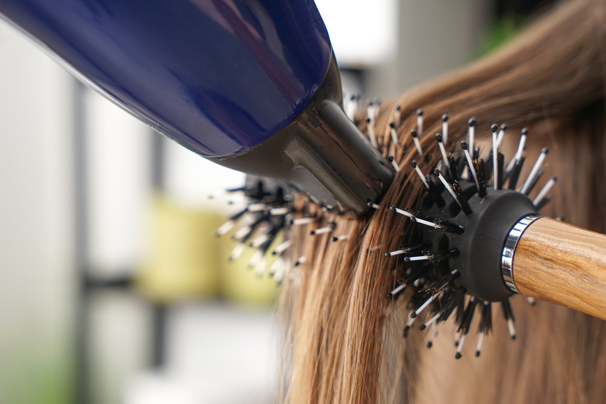 Brushing of Long Female Hair in Salon, Closeup
